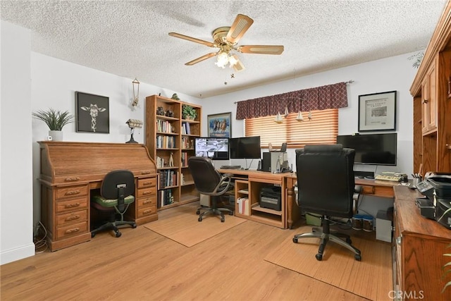 3291 Lemon Dr, Simi Valley, CA 93063 - home office with a ceiling fan, light wood-style floors, and a textured ceiling