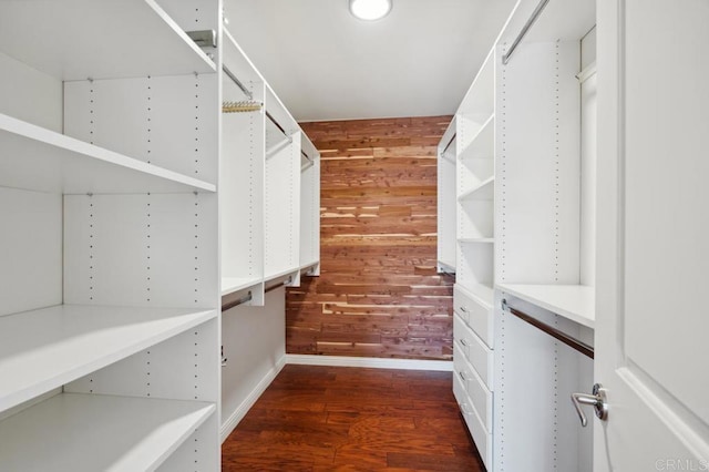 spacious closet featuring wood finished floors
