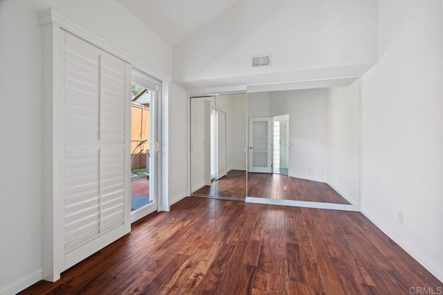 3521 Andrews St, San Diego, CA 92103 - unfurnished bedroom featuring high vaulted ceiling, wood finished floors, access to outside, baseboards, and a closet