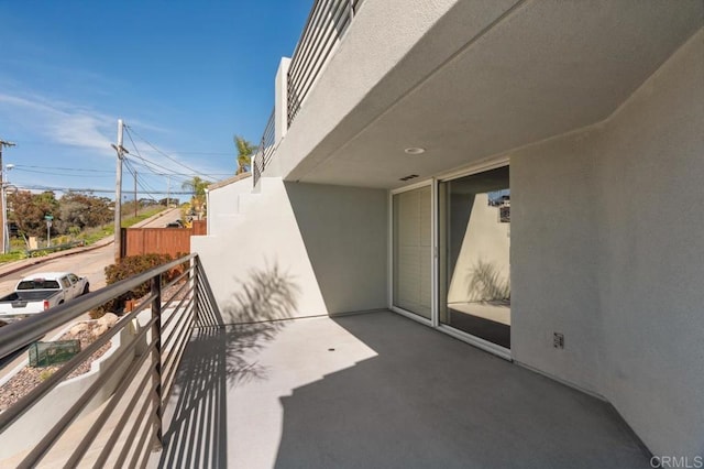 view of patio / terrace with a balcony