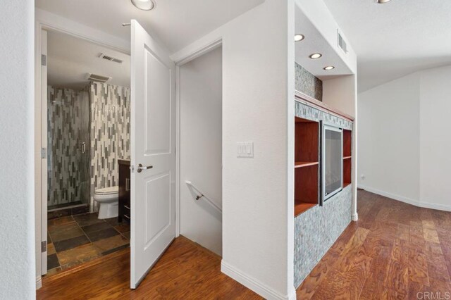 3519 Andrews St, San Diego, CA 92103 - hallway featuring recessed lighting, wood finished floors, and an upstairs landing