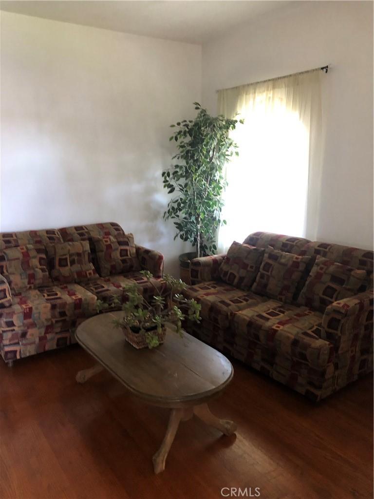 living area featuring wood finished floors