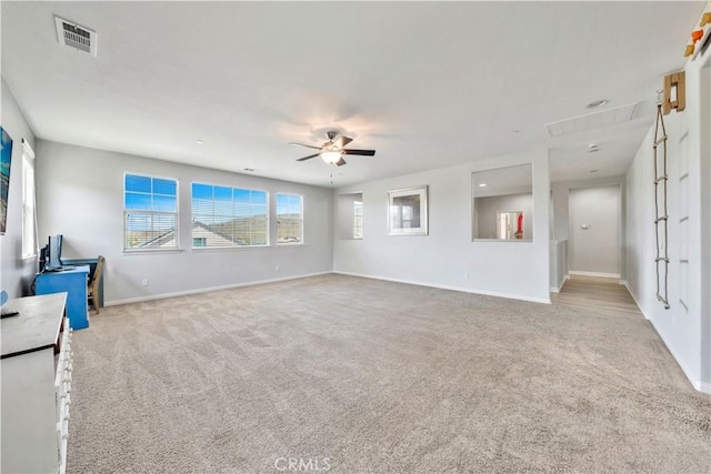 26165 Santiago Canyon Rd, Corona, CA 92883 - unfurnished living room featuring ceiling fan, carpet flooring, baseboards, and visible vents