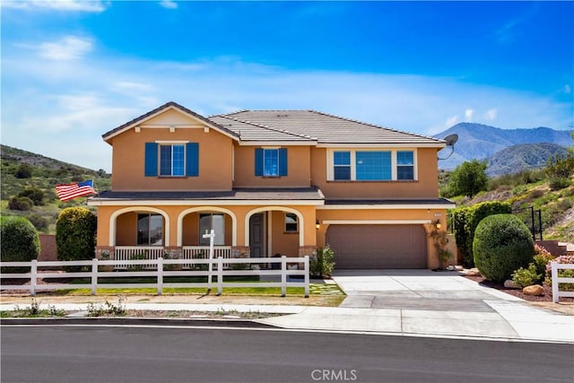 26165 Santiago Canyon Rd, Corona, CA 92883 - traditional-style home featuring stucco siding, a mountain view, an attached garage, and fence