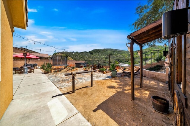26165 Santiago Canyon Rd, Corona, CA 92883 - view of yard with a fenced backyard and a patio area
