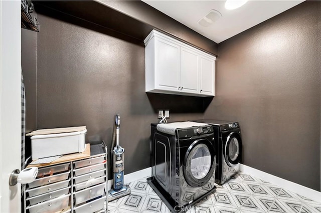 26165 Santiago Canyon Rd, Corona, CA 92883 - laundry room with washer and dryer, cabinet space, and baseboards