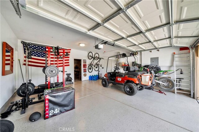 26165 Santiago Canyon Rd, Corona, CA 92883 - garage featuring electric panel and a garage door opener