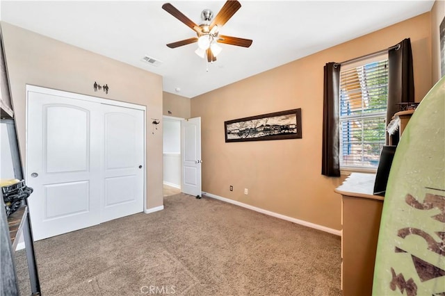 26165 Santiago Canyon Rd, Corona, CA 92883 - unfurnished bedroom with a closet, carpet, baseboards, ceiling fan, and visible vents