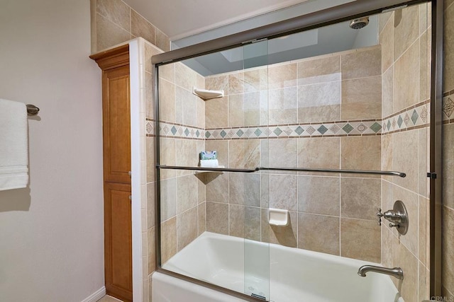 159 Mozart Ave, Cardiff By The Sea, CA 92007 - bathroom with combined bath / shower with glass door and baseboards