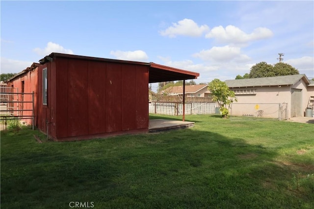 view of outbuilding featuring an outbuilding and fence