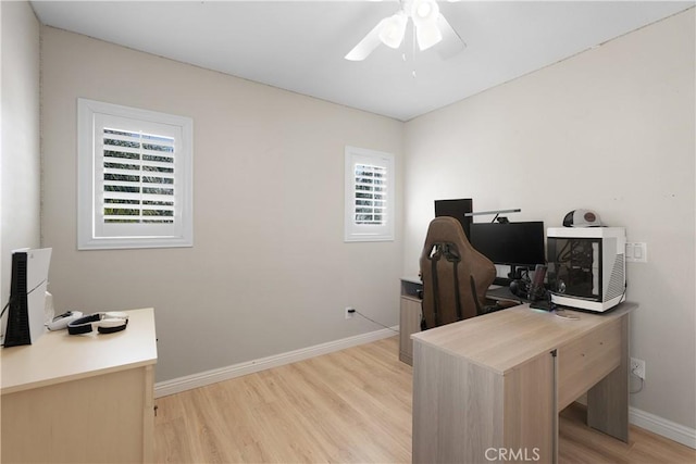 29851 Fox Creek Dr, Menifee, CA 92586 - office area featuring light wood finished floors, a ceiling fan, and baseboards
