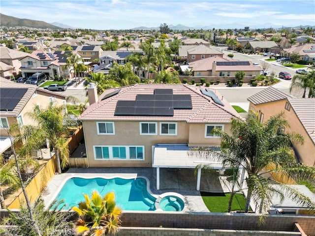 29851 Fox Creek Dr, Menifee, CA 92586 - view of pool with a residential view, a fenced backyard, a pool with connected hot tub, a patio area, and a mountain view