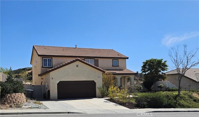 1445 Sandy Hill Dr, Calimesa, CA 92320 - view of front facade with a tile roof, driveway, an attached garage, fence, and stucco siding