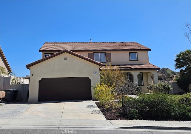1445 Sandy Hill Dr, Calimesa, CA 92320 - mediterranean / spanish-style house featuring fence, a tiled roof, stucco siding, driveway, and a garage