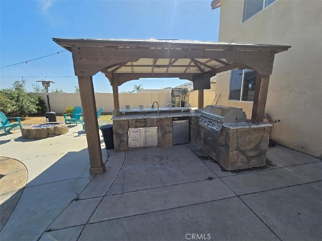 1445 Sandy Hill Dr, Calimesa, CA 92320 - view of patio / terrace featuring area for grilling, a grill, fence, an outdoor fire pit, and a gazebo