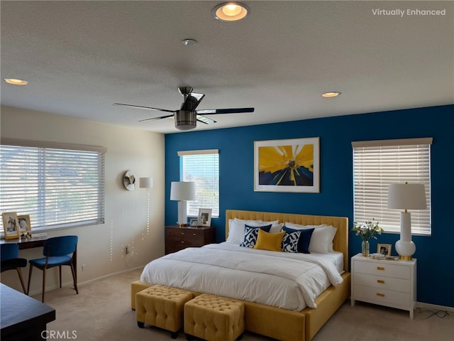1445 Sandy Hill Dr, Calimesa, CA 92320 - bedroom featuring light colored carpet, ceiling fan, baseboards, and a textured ceiling