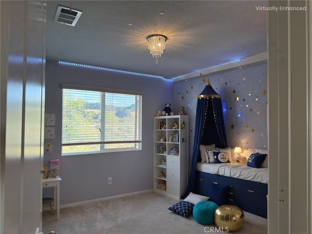 1445 Sandy Hill Dr, Calimesa, CA 92320 - carpeted bedroom with baseboards, visible vents, and a textured ceiling