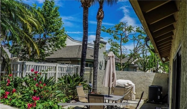 1725 Truman Cir, Placentia, CA 92870 - view of patio / terrace featuring a fenced backyard, central AC, and outdoor dining area