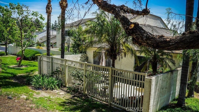 1725 Truman Cir, Placentia, CA 92870 - view of side of property with fence and stucco siding