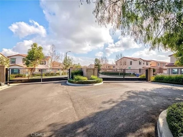5772 Marabe Way, Riverside, CA 92505 - view of road with a gated entry, a residential view, and a gate