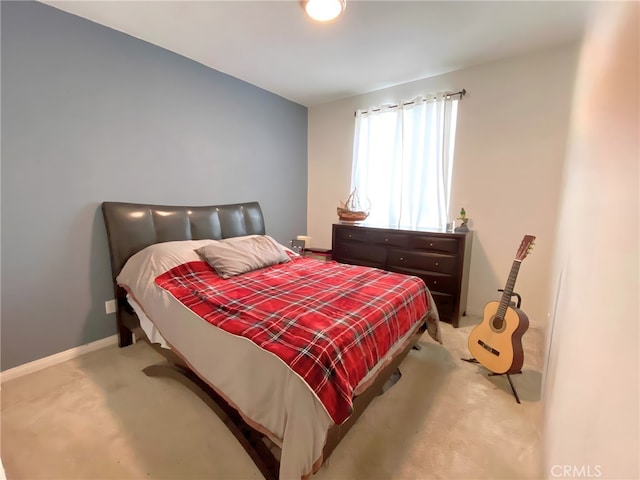 5772 Marabe Way, Riverside, CA 92505 - bedroom with baseboards and light carpet