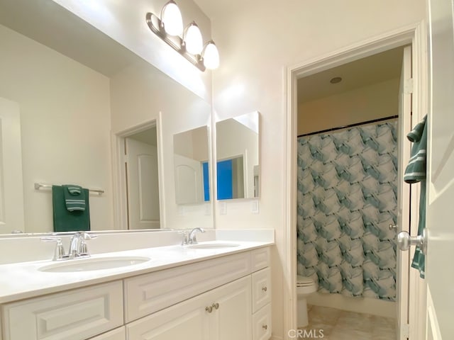 5772 Marabe Way, Riverside, CA 92505 - bathroom featuring double vanity, a sink, tile patterned floors, and toilet
