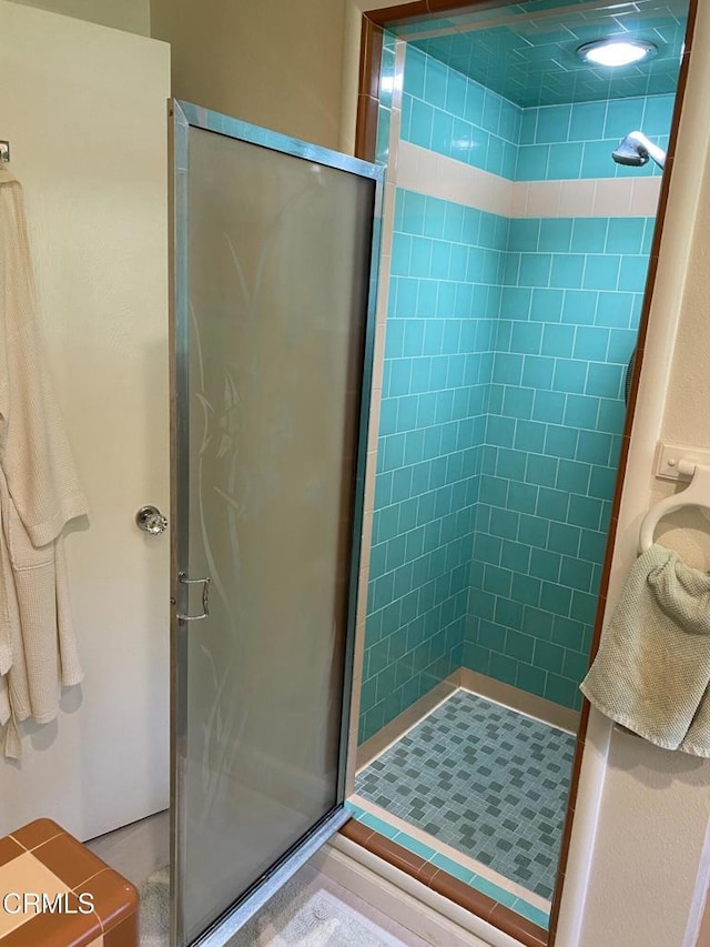 full bathroom featuring a stall shower