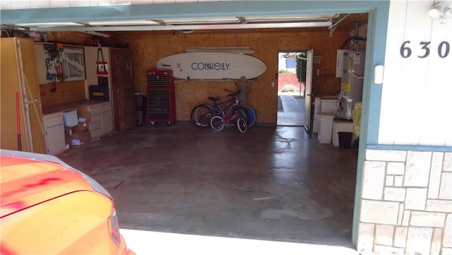 6301 Park Ave, Lake Isabella, CA 93240 - garage with water heater and freestanding refrigerator