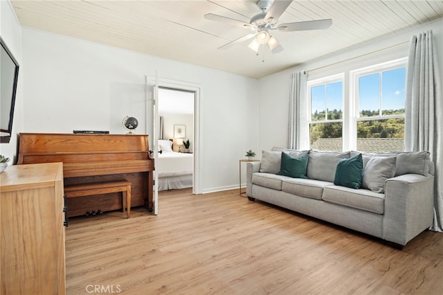 2007 3rd St, Julian, CA 92036 - living room featuring light wood-style floors, baseboards, and a ceiling fan
