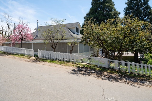 2007 3rd St, Julian, CA 92036 - view of property exterior featuring a sunroom and a fenced front yard