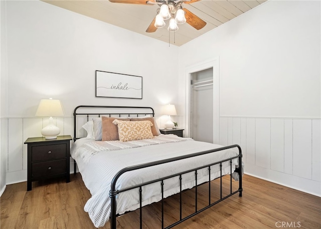 2007 3rd St, Julian, CA 92036 - bedroom featuring wood finished floors, ceiling fan, wainscoting, and a decorative wall