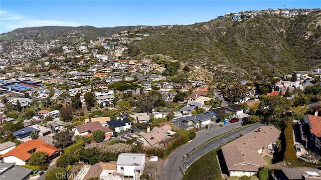 birds eye view of property with a residential view and a mountain view