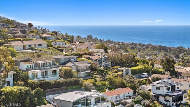bird's eye view with a water view and a residential view