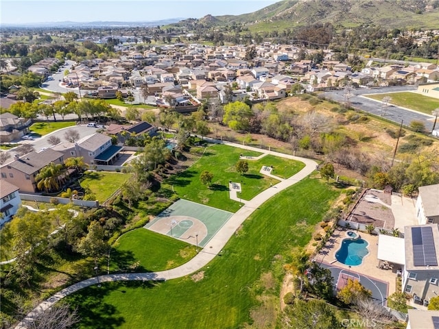 bird's eye view with a residential view and a mountain view