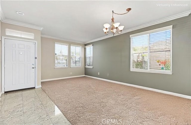 entryway featuring light carpet, baseboards, crown molding, and a chandelier
