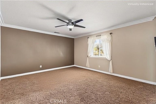 carpeted spare room featuring crown molding, baseboards, and ceiling fan