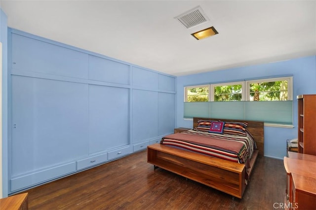 4365 Alta Vista Dr, Riverside, CA 92506 - bedroom with wood finished floors and a decorative wall