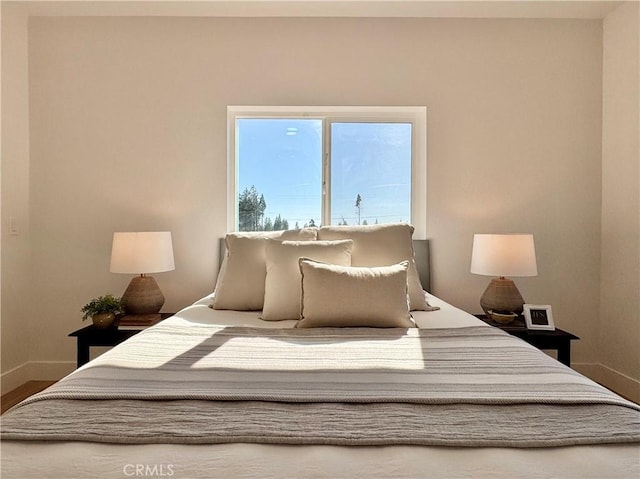bedroom with baseboards