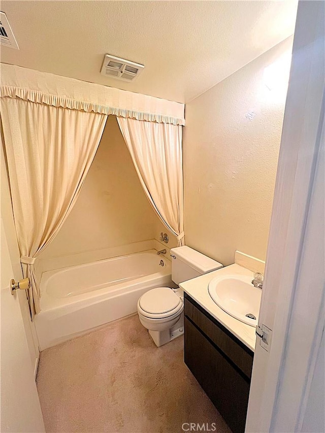 4971 W Gilman St, Banning, CA 92220 - full bath with toilet, vanity, and a textured ceiling