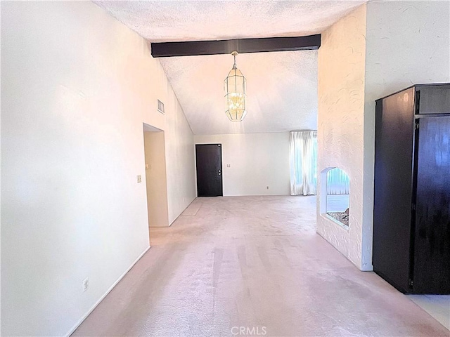 4971 W Gilman St, Banning, CA 92220 - hallway with a chandelier, light carpet, and a textured ceiling