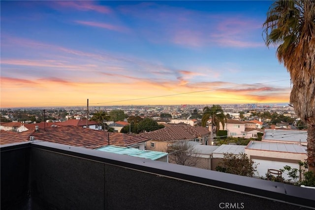 balcony at dusk with a residential view