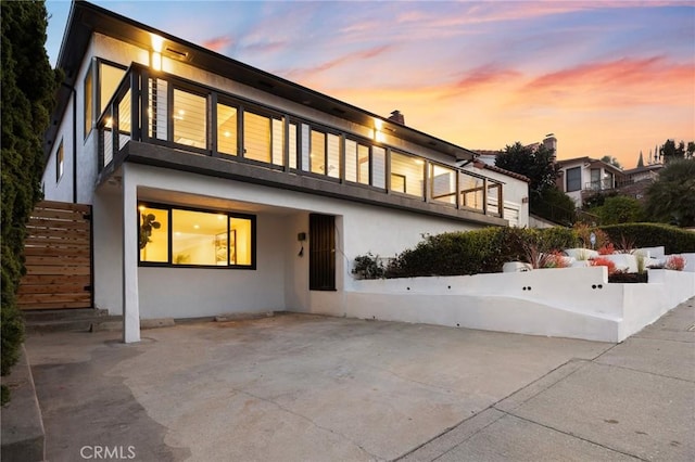 1331 W 17th St, San Pedro, CA 90732 - rear view of property featuring stucco siding and a patio area
