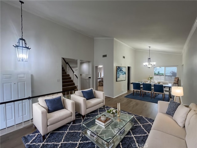 901 Vista Verde Cir, Duarte, CA 91010 - living area featuring a chandelier, stairs, wood finished floors, ornamental molding, and baseboards