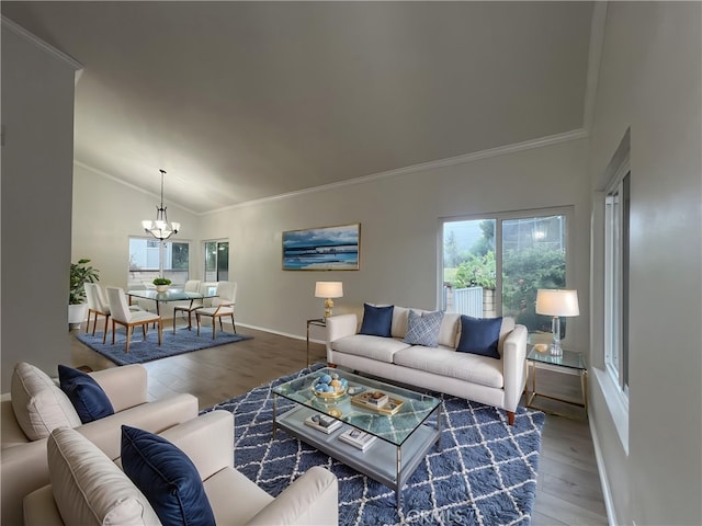 901 Vista Verde Cir, Duarte, CA 91010 - living area with wood finished floors, a chandelier, lofted ceiling, ornamental molding, and baseboards
