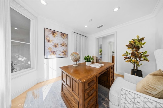 home office with recessed lighting, visible vents, and light wood-style floors