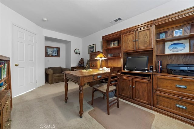 home office featuring visible vents and light colored carpet
