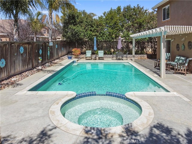 view of pool with a fenced backyard, a pool with connected hot tub, a pergola, and a patio area