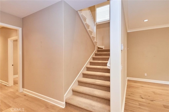 54 Trotter, Irvine, CA 92602 - stairs with wood finished floors, ornamental molding, and recessed lighting