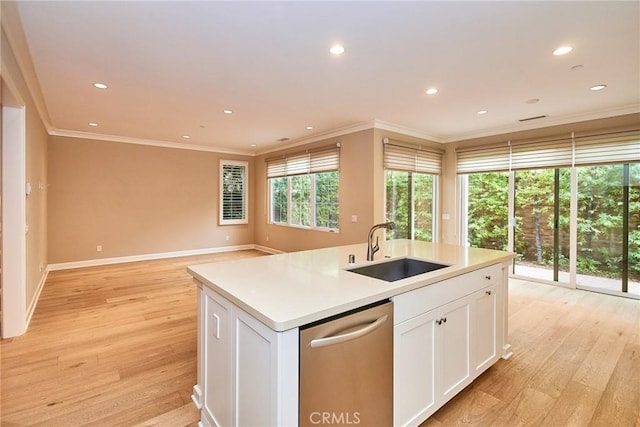 54 Trotter, Irvine, CA 92602 - kitchen with dishwasher, light wood finished floors, white cabinets, crown molding, and an island with sink