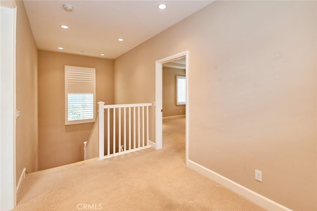 54 Trotter, Irvine, CA 92602 - corridor with carpet, an upstairs landing, and recessed lighting